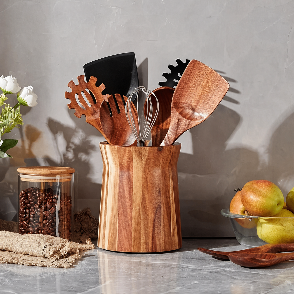 minimalist kitchen organization with wooden utensil holder and neutral decor
