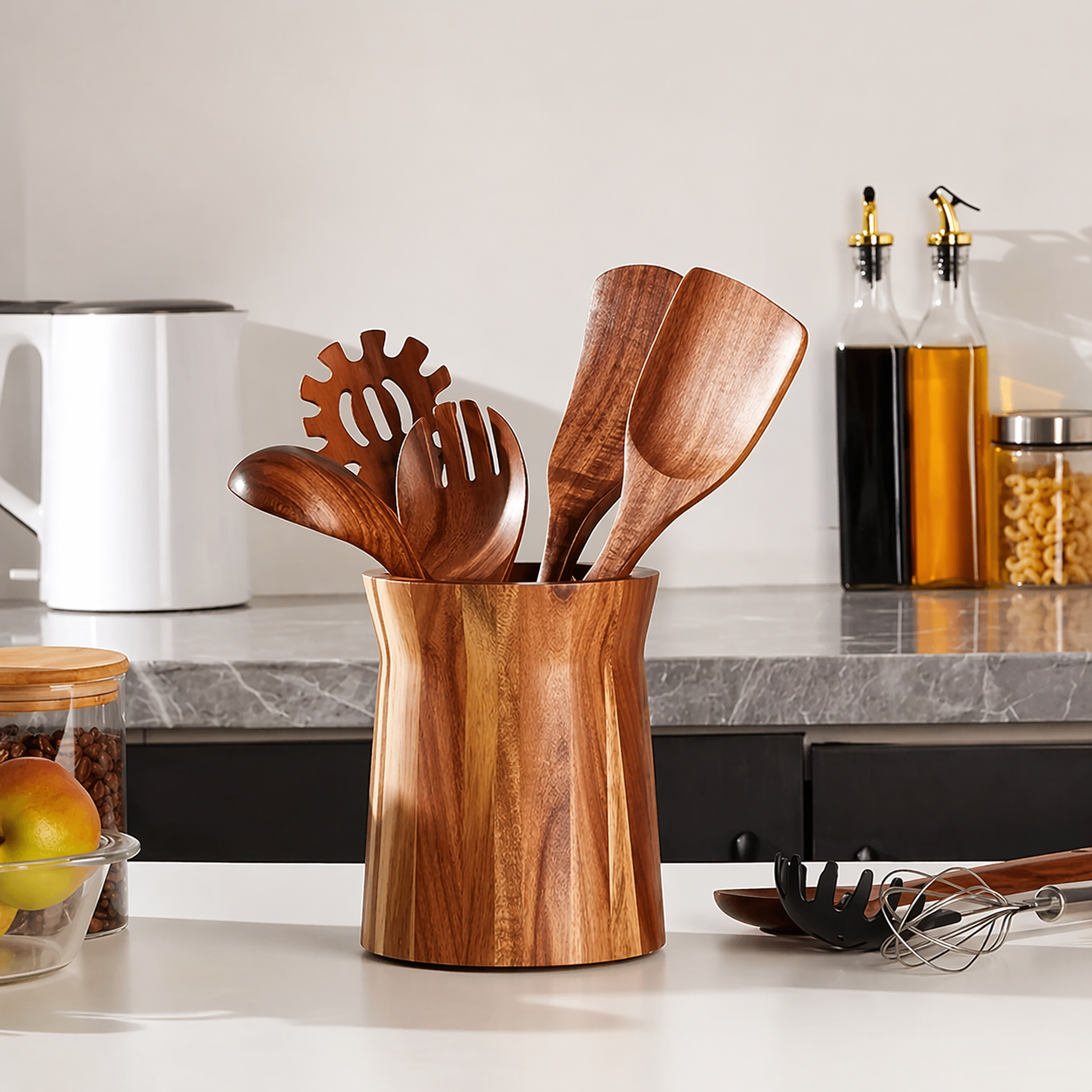 natural wood utensil holder with spoons and spatulas organized kitchen countertop