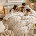 Family enjoying an ivory textured weighted blanket in a warm luxury bedroom with calm neutral decor