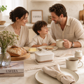 Family enjoying a calm breakfast moment with a speckled ceramic butter dish on a luxury neutral kitchen table