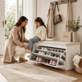 Mother helping her daughter put on shoes beside a premium white shoe storage bench in a calm luxury entryway