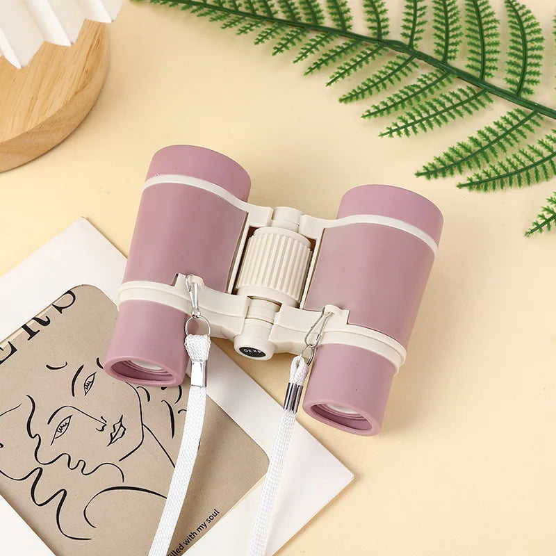 Pink children’s binoculars for outdoor exploration and family adventures