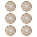 Round burlap macrame placemats styled on a light wood dining table