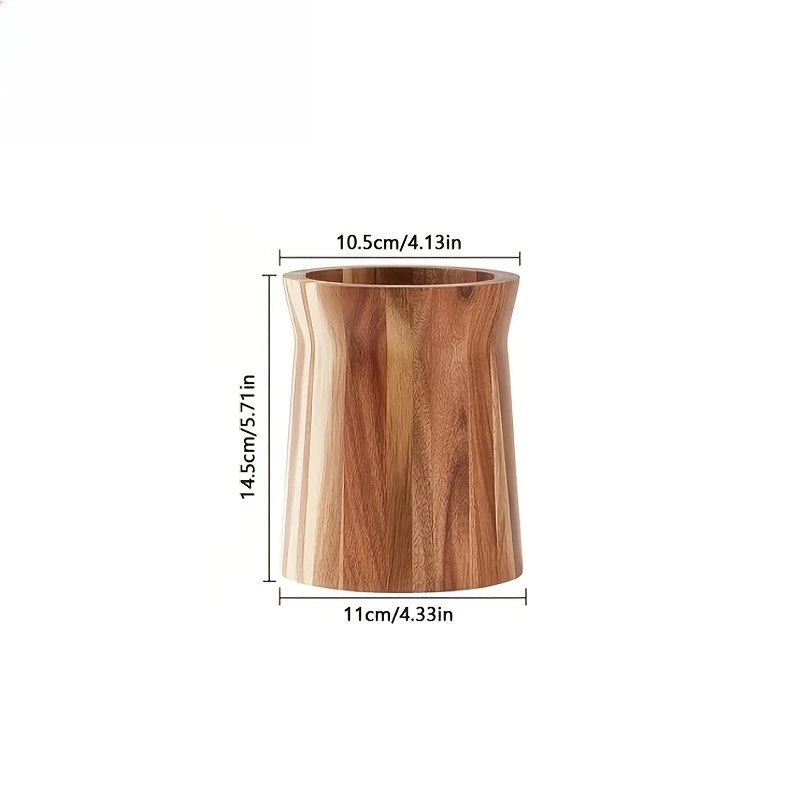 calm kitchen setup with wooden utensils holder and natural home aesthetic