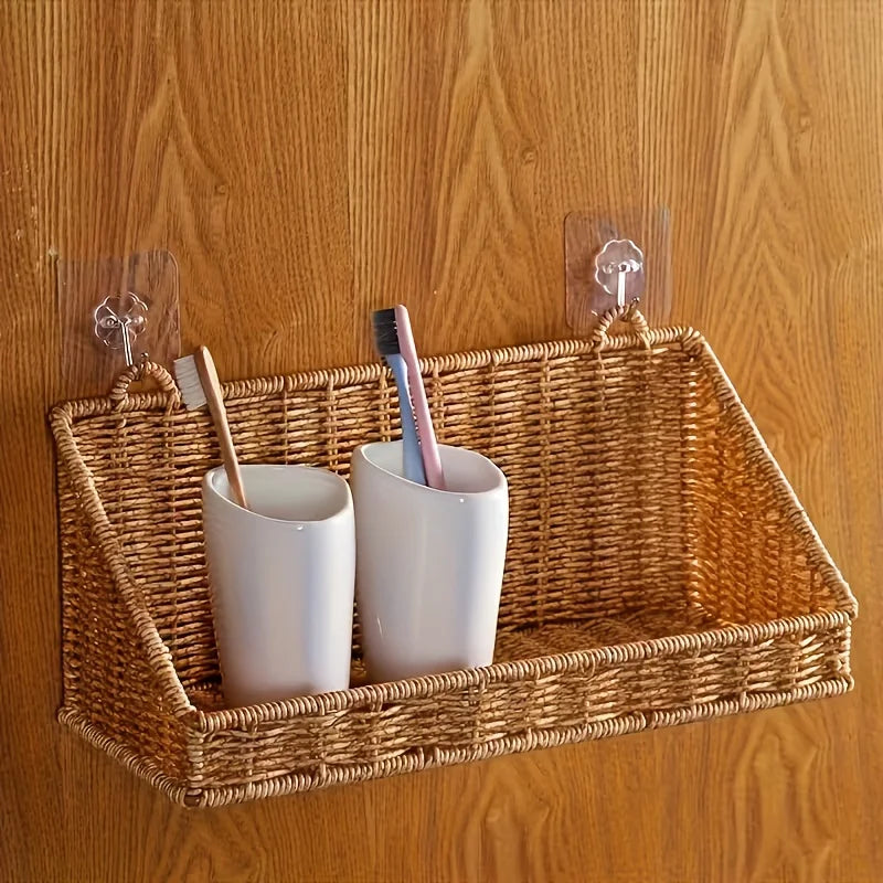 Minimalist wall basket storage with children’s books, warm beige interior and calm home aesthetic