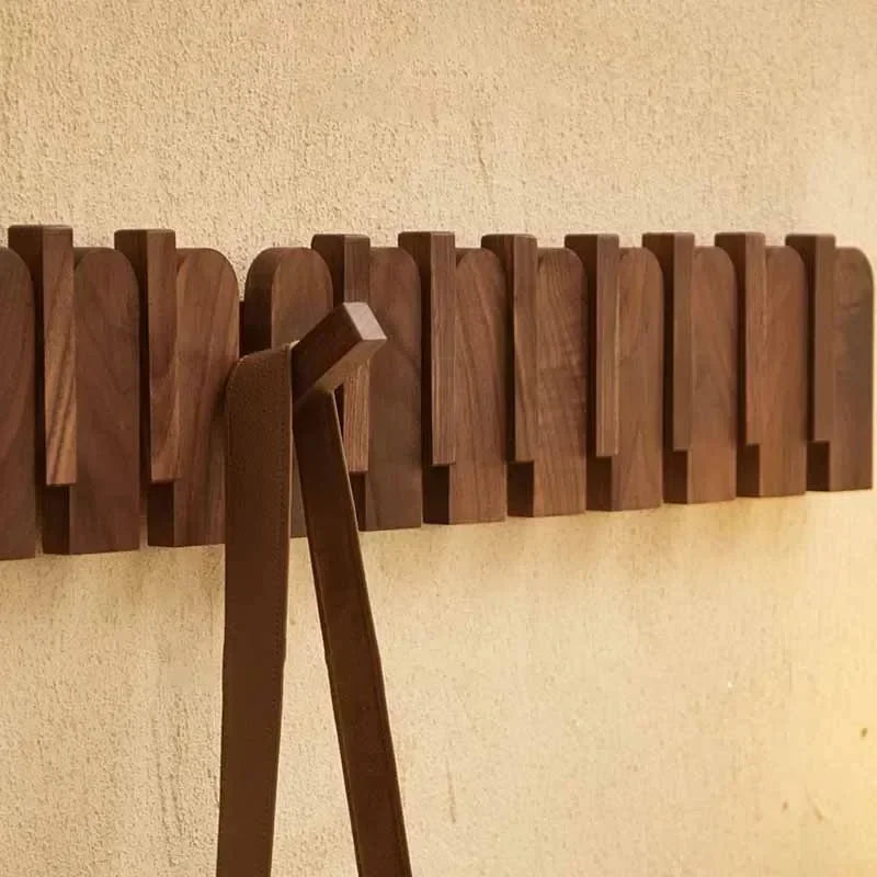 Dark wood wall hook rack for jackets, bags, and everyday family essentials