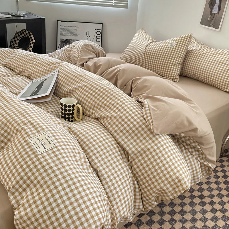 Beige gingham duvet cover set styled on a neutral bed with matching pillow covers for calm bedroom decor.