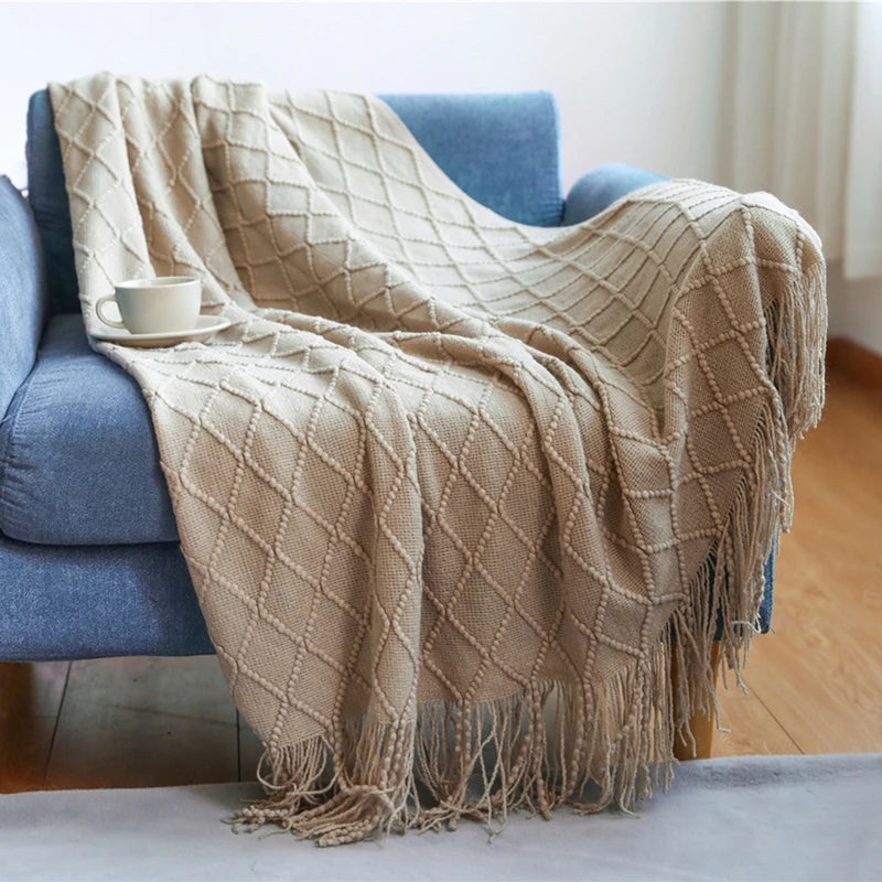 Soft Nordic throw blanket in a warm beige tone, perfect for sofa reading time, bedroom comfort, and peaceful home routines.