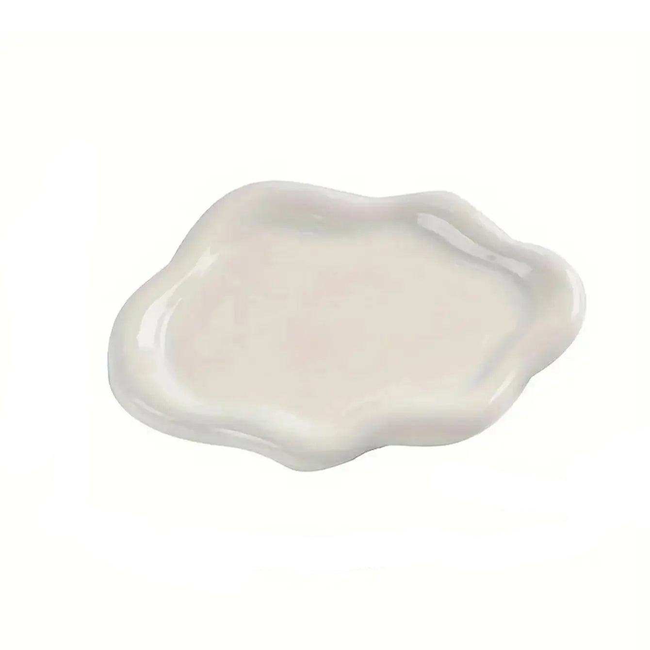 White ceramic jewelry tray in a premium family living room with Usfera decor accents and elegant neutral styling
