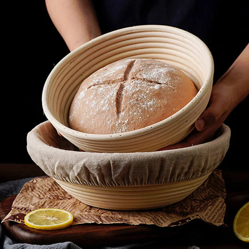 Rattan bread proofing basket with liner holding a round homemade loaf for calm family baking routines