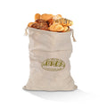 Reusable linen bread bag filled with fresh bread and pastries for calm kitchen storage