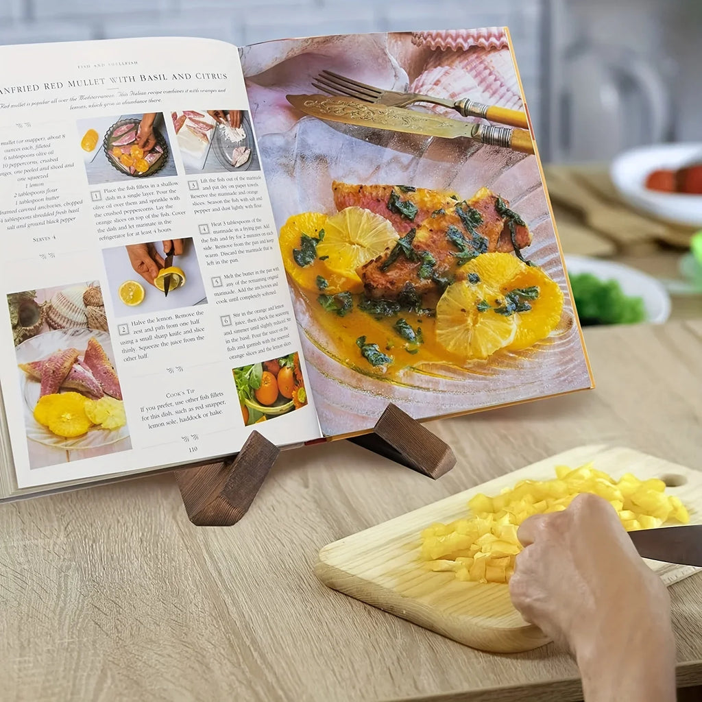 Dark wood recipe book holder displaying an open cookbook on a kitchen counter