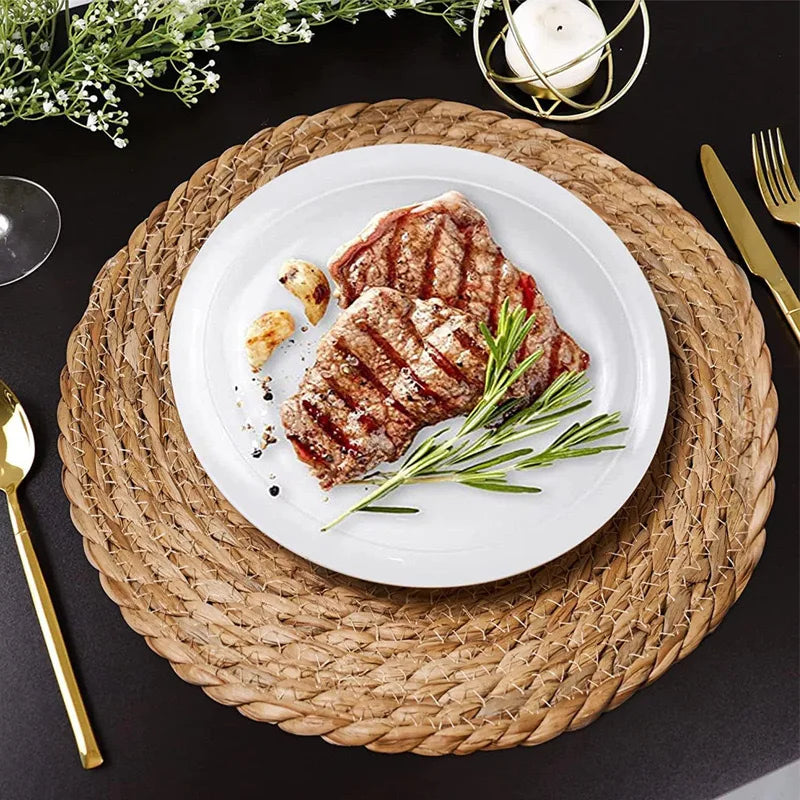 Luxury flat lay dining scene with rattan placemat, white ceramic plate and gold cutlery – The Elegant Table by Usfera
