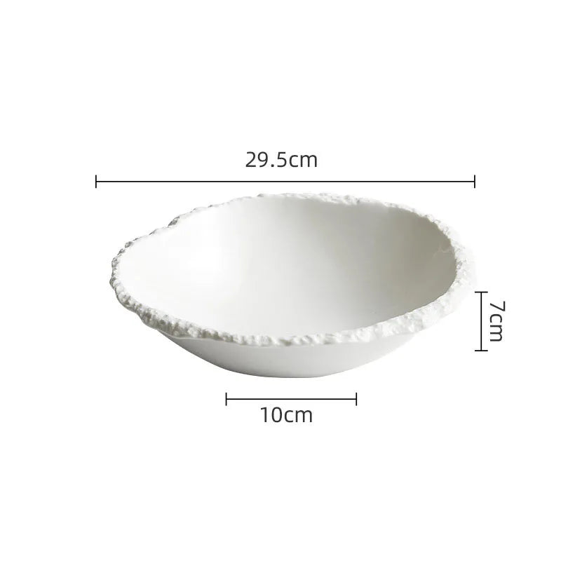 Large white porcelain serving bowl styled in a luxury family dining scene with USFERA branding on a separate card
