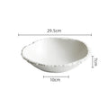 Large white porcelain serving bowl styled in a luxury family dining scene with USFERA branding on a separate card