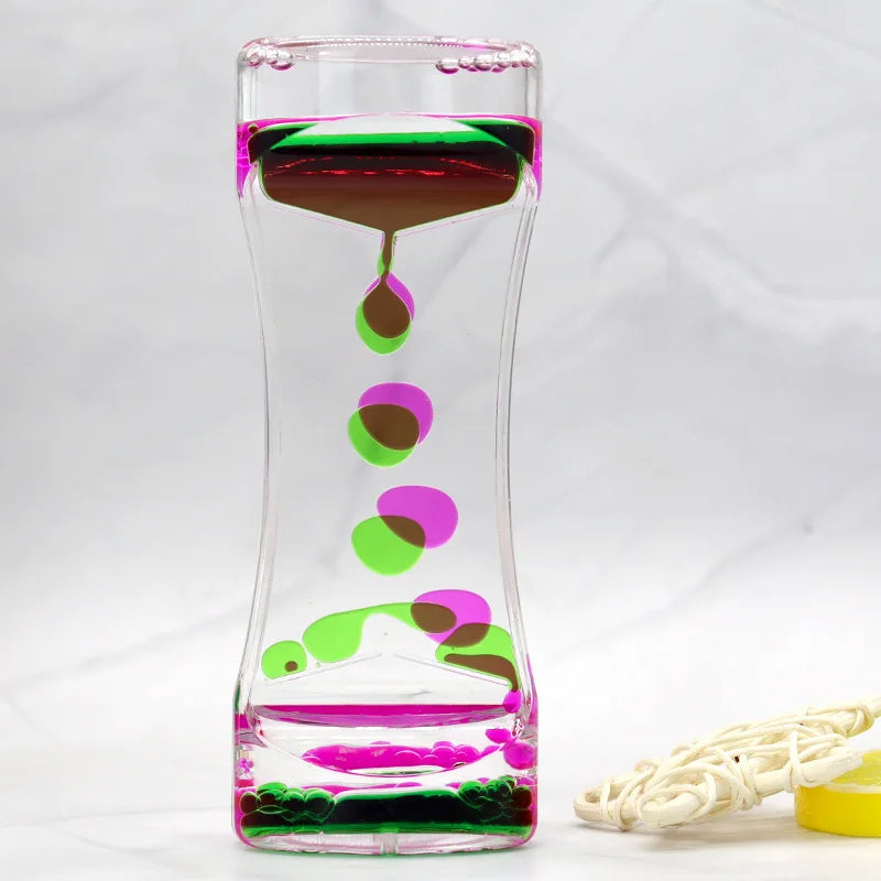 Red and green liquid motion timer for quiet reset moments