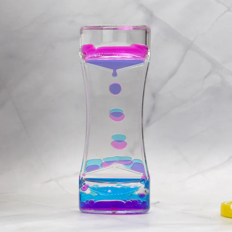 Pink and blue liquid motion timer for quiet reset moments