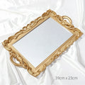 Gold ornate decorative tray on marble nightstand in elegant luxury bedroom — Usfera

