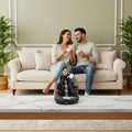 Couple relaxing in luxury living room with zen mountain incense burner on marble shelf — Usfera
